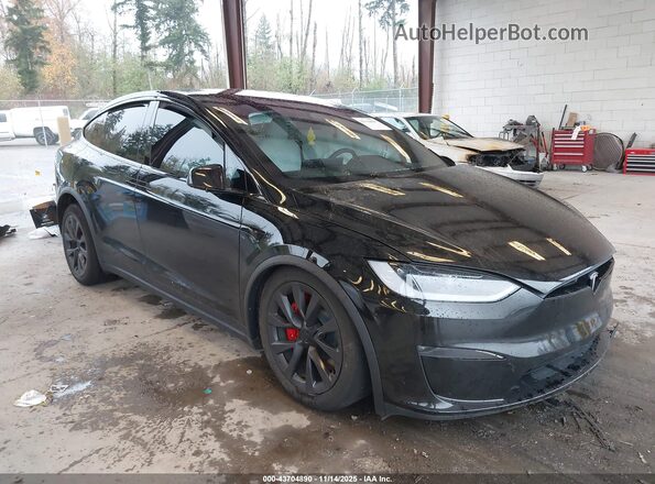 7SAXCBE67RF457369 2024 TESLA MODEL X Черный Передняя правая четверть