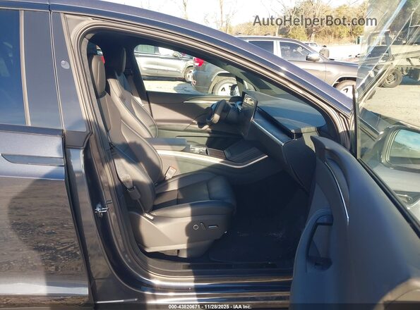 7SAXCDE57RF459268 2024 TESLA MODEL X Черный Вид салона спереди