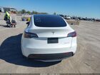 2022 Tesla Model Y Long Range Dual Motor All-wheel Drive White vin: 7SAYGAEE0NF536449