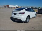 2022 Tesla Model Y Long Range Dual Motor All-wheel Drive White vin: 7SAYGAEE0NF536449