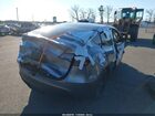 2024 Tesla Model Y Long Range Dual Motor All-wheel Drive Silver vin: 7SAYGAEE3RF212921