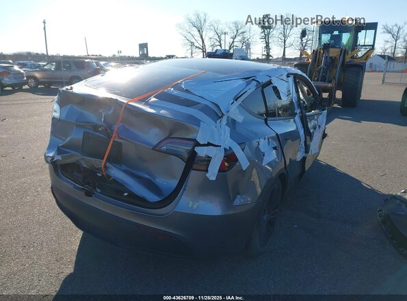 7SAYGAEE3RF212921 2024 TESLA MODEL Y Silver Tył prawy