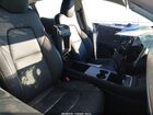2024 Tesla Model Y Long Range Dual Motor All-wheel Drive Silver vin: 7SAYGAEE3RF212921