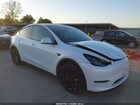 2024 Tesla Model Y Long Range Dual Motor All-wheel Drive White vin: 7SAYGAEE4RF039040