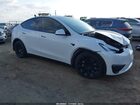 2022 Tesla Model Y Long Range Dual Motor All-wheel Drive White vin: 7SAYGAEE8NF313575