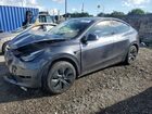 2025 Tesla Model Y Charcoal vin: 7SAYGDED1SA365292