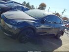 2025 Tesla Model Y Long Range Dual Motor Rear-wheel Drive Gray vin: 7SAYGDED1SA368287