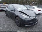 2025 Tesla Model Y Long Range Dual Motor Rear-wheel Drive Серый vin: 7SAYGDED5SF258801