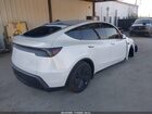 2026 Tesla Model Y Rwd White vin: 7SAYGDED6TA427996