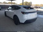 2026 Tesla Model Y Rwd White vin: 7SAYGDED6TA427996