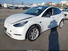 2022 Tesla Model Y Long Range Dual Motor All-wheel Drive White vin: 7SAYGDEE0NF363789