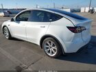 2022 Tesla Model Y Long Range Dual Motor All-wheel Drive White vin: 7SAYGDEE0NF363789