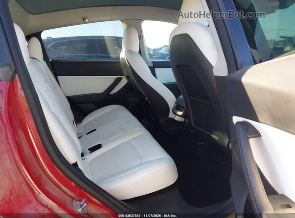 7SAYGDEE0NF391625 2022 TESLA MODEL Y Red VIN კოდის სტიკერის ხედი