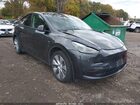 2024 Tesla Model Y Long Range Dual Motor All-wheel Drive Серый vin: 7SAYGDEE2RA258464