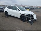 2024 Tesla Model Y Long Range Dual Motor All-wheel Drive White vin: 7SAYGDEE3RA259090