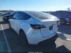 2025 Tesla Model Y Long Range Dual Motor All-wheel Drive White vin: 7SAYGDEE3SF223490