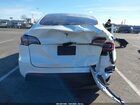 2025 Tesla Model Y Long Range Dual Motor All-wheel Drive White vin: 7SAYGDEE3SF223490