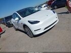 2024 Tesla Model Y Long Range Dual Motor All-wheel Drive White vin: 7SAYGDEE4RA267781