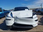 2026 Tesla Model Y Long Range Dual Motor All-wheel Drive/long Range Launch Series White vin: 7SAYGDEE4TA496114