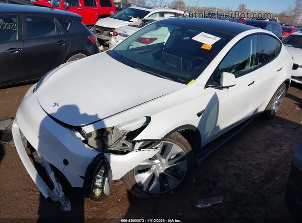 7SAYGDEE6PF683699 2023 TESLA MODEL Y White Vista tres cuartos delantera izquierda