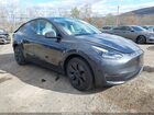 2024 Tesla Model Y Long Range Dual Motor All-wheel Drive Серый vin: 7SAYGDEE6RA321209