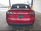 2025 Tesla Model Y Long Range Dual Motor All-wheel Drive Red vin: 7SAYGDEE6SF237450