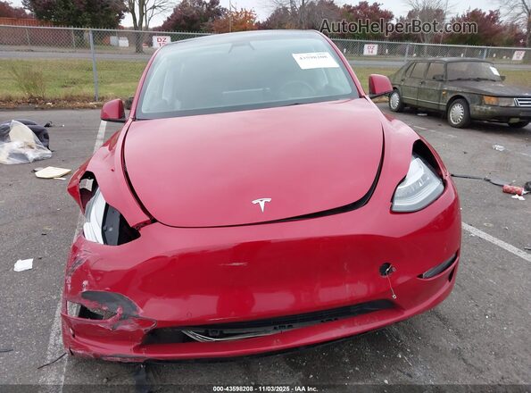 7SAYGDEE8NF310077 2022 TESLA MODEL Y Red Widok deski rozdzielczej