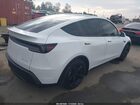 2026 Tesla Model Y Long Range Dual Motor All-wheel Drive/long Range Launch Series White vin: 7SAYGDEE8TF409950