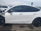 2026 Tesla Model Y Long Range Dual Motor All-wheel Drive/long Range Launch Series White vin: 7SAYGDEE8TF409950