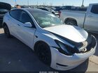 2023 Tesla Model Y Awd/long Range Dual Motor All-wheel Drive White vin: 7SAYGDEE9PA076306
