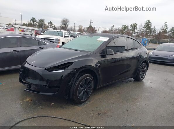 7SAYGDEE9SA355439 2025 TESLA MODEL Y Black Առջևի ձախ երեք քառորդ տեսարան