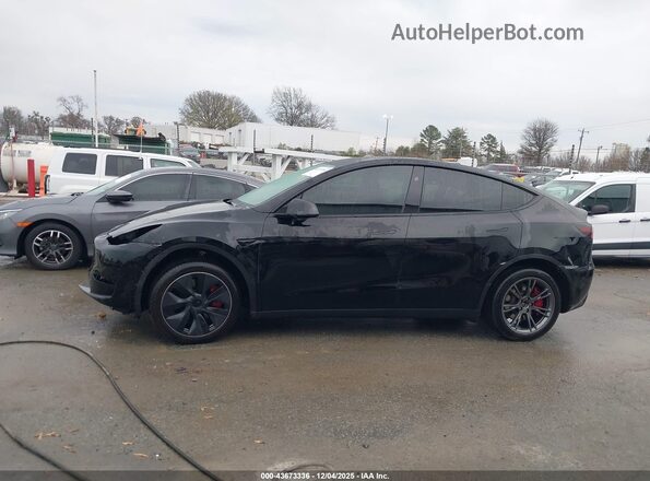 7SAYGDEE9SA355439 2025 TESLA MODEL Y Black Սալոնի հետևի տեսք