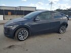 2026 Tesla Model Y Серый vin: 7SAYGDEE9TA400347