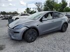 2026 Tesla Model Y Gray vin: 7SAYGDEE9TA464906