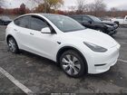 2024 Tesla Model Y Long Range Dual Motor All-wheel Drive White vin: 7SAYGDEEXRA278932