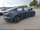 2025 Tesla Model Y Performance Dual Motor All-wheel Drive Gray vin: 7SAYGDEF1SA336487