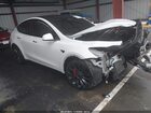 2024 Tesla Model Y Performance Dual Motor All-wheel Drive White vin: 7SAYGDEF6RF107770