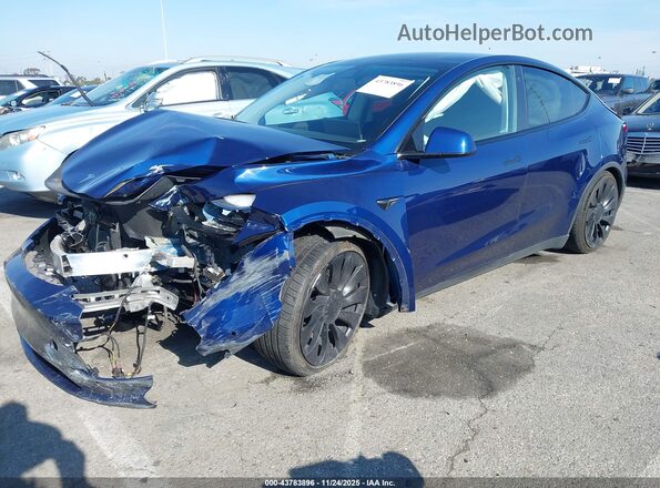 7SAYGDEF7NF401057 2022 TESLA MODEL Y Blue წინა მარცხენა ხედი სამი მეოთხედიდან