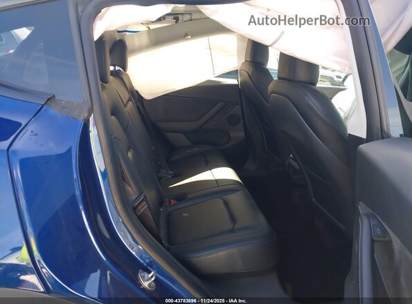 7SAYGDEF7NF401057 2022 TESLA MODEL Y Blue VIN კოდის სტიკერის ხედი