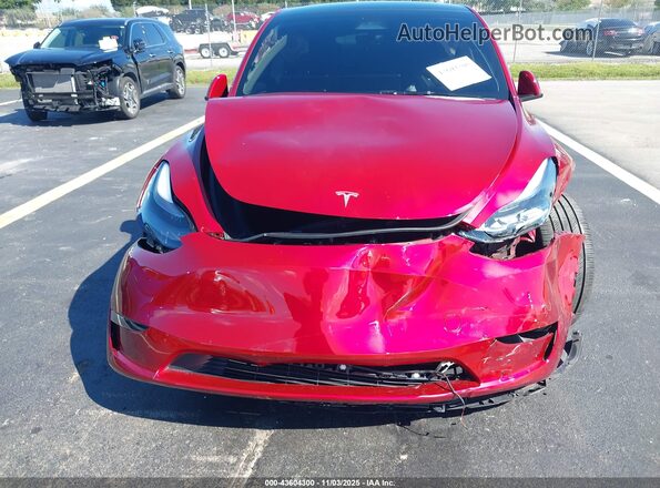 7SAYGDEF7SA349289 2025 TESLA MODEL Y Красный Вид салона спереди