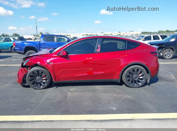 7SAYGDEF7SA349289 2025 TESLA MODEL Y Красный Вид задней части салона