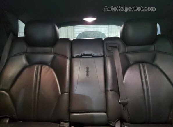 2LMHJ5NKXJBL01799 2018 LINCOLN MKT Черный Вид задней части салона