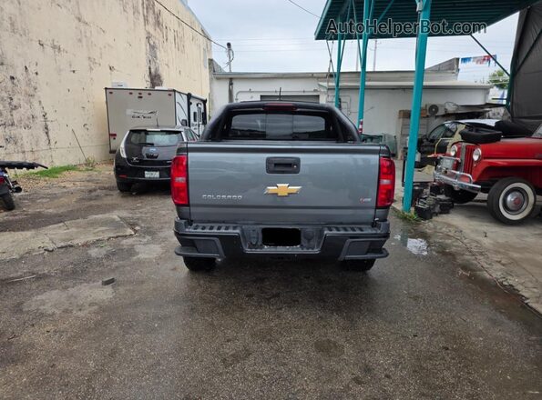 1GCGTEEN1M1127427 2021 CHEVROLET COLORADO Серый Вид салона спереди