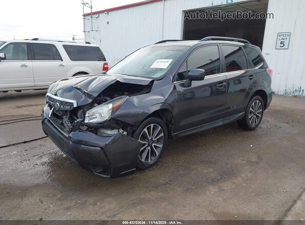 JF2SJGEC6JH549577 2018 SUBARU FORESTER2. Серый Передняя левая четверть