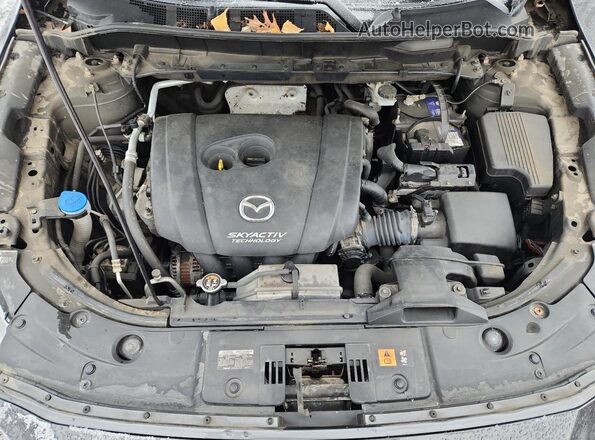 JM3KFBCL0H0170175 2017 MAZDA CX-5 Gray Widok wnętrza z tyłu