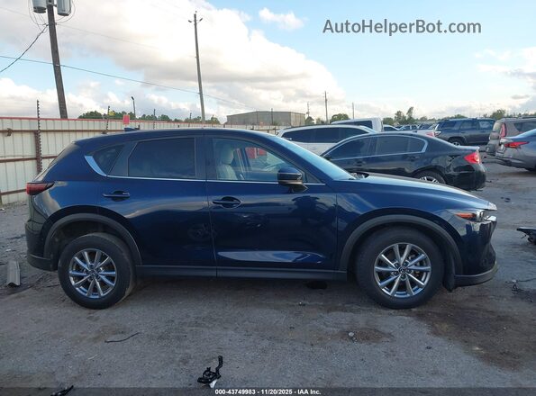 JM3KFBCMXN1565446 2022 MAZDA CX-5 Navy Вид задней части салона