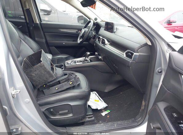 JM3KFBDM9P0203521 2023 MAZDA CX-5 Серебряный Вид салона спереди