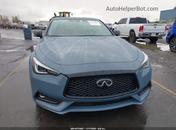 JN1FV7LKXMM530513 2021 INFINITI Q60 Light Blue Вид панели приборов