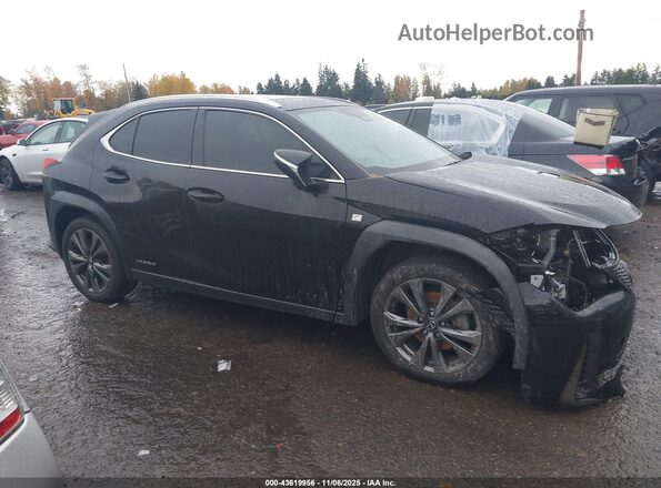 JTHU9JBH1K2012373 2019 LEXUS UX 250H Black Vista interior trasera