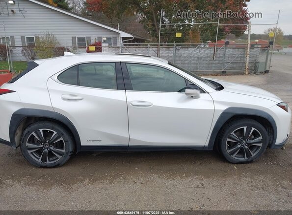 JTHU9JBH5K2013980 2019 LEXUS UX 250H White Vista interior trasera